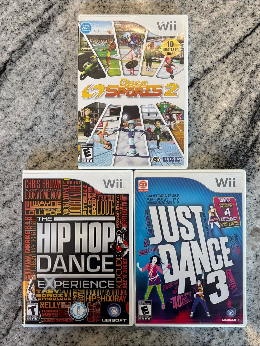 Nintendo Wii Game Bundle - Hip Hop Dance Experience, Just Dance 3 & Deca Sports